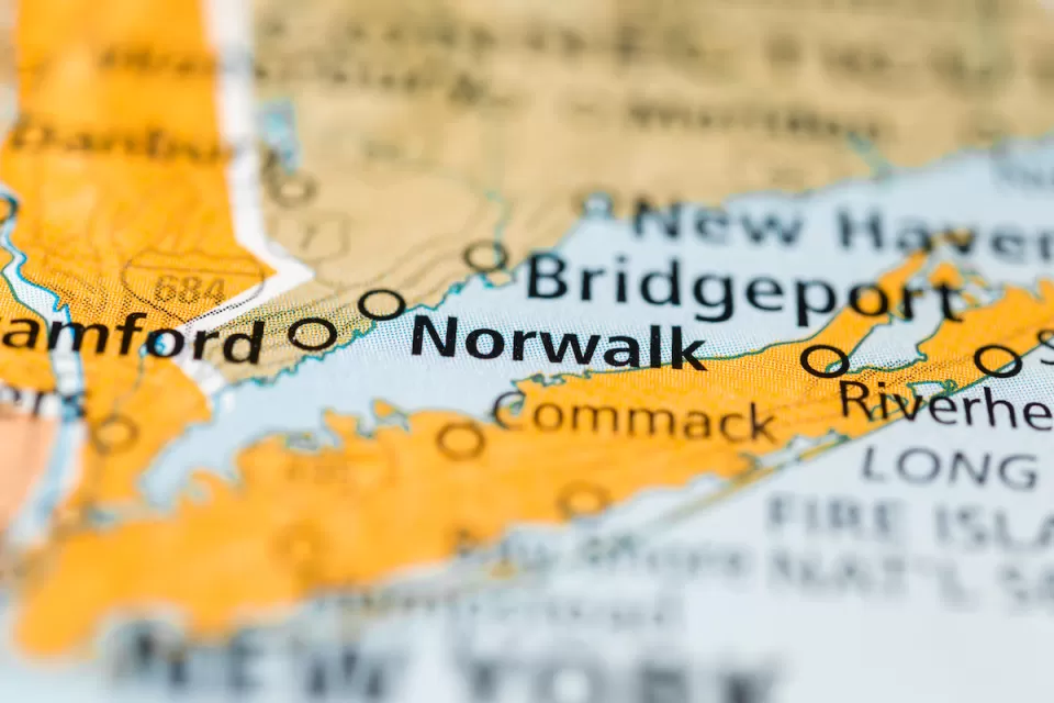 A map of the Connecticut shoreline along the Long Island Sound highlights the cities of Norwalk and Bridgeport, among others.
